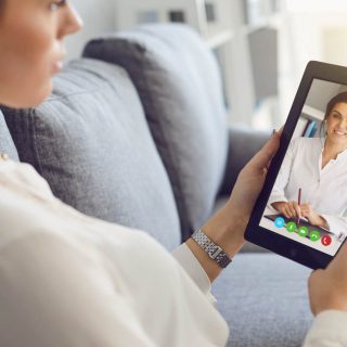 A patient using telemedicine for a doctor's appointment