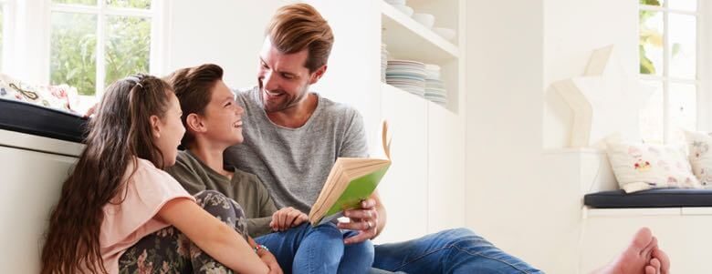 family reading a book